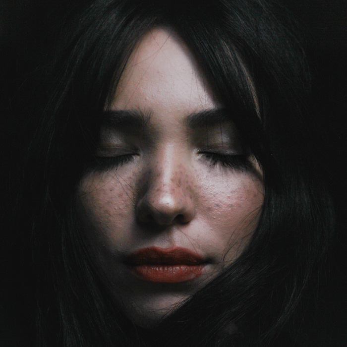 Healing chronic illness, photograph of woman's face by Zulmaury Saavedra
