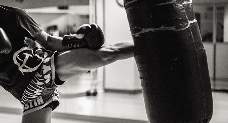 Photograph of kickboxing by Justin Ng