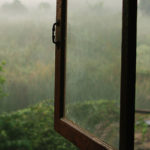 Beyond The Label: Breaking Free From The Stigma (and Clutches) of Mental Illness, Naturally by Christina Bjorndal. Photograph of misty valley outside window by Hannah Tims.