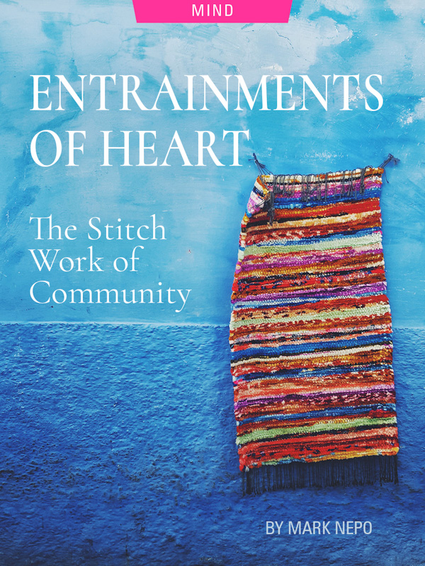 Entrainments of Heart: The Stitch Work of Community by Mark Nepo. Photograph of stitched blanking hanging on wall by Wael Lakhnifri