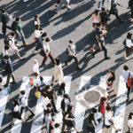Chronic Stress: The Silent Hormone (And Life) Hijacker Dr. Stephanie Gray. Photograph of busy crosswalk with people by Ryoji Iwata