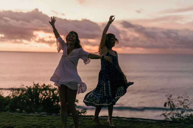 Photograph of Britt and Tara dancing at sunset
