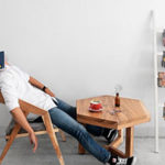 5 Ways to Reduce Fatigue Through Minor Shifts In Your Lifestyle by Anna Kucirkova. Photograph of a man asleep at a table by Hutomo Abrianto