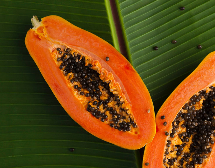 Photograph of open papaya by Miguel Maldonado