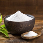Sugar Alternative: Sweet and Healthful Benefits of Stevia by Paisley Hansen. Photograph of a wooden bowl full of Stevia by Louis Echeverri Urrea