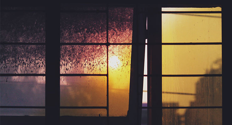 Soul Murmurs: Poetry, Prose and Musings for the Spirit by Anita Neilson. Photograph of the sun through a dirty window by Prottoy Hassan
