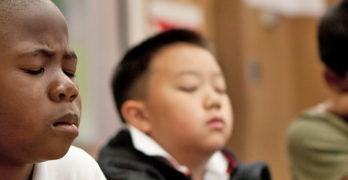 Mindfulness in the Classroom: Learning from the Inside Out by Laura Bakosh. Photograph of children meditating courtesy of Laura Bakosh
