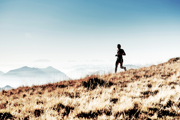 Tips to Make Your Workout Eco-Friendly, by Ian Lewis. Photograph of runner outdoors by Asoggetti