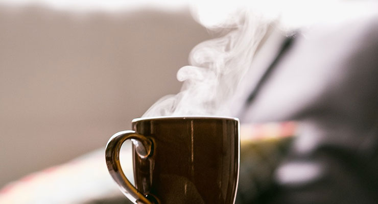 Have A Fantastic Day: A Morning Routine that Sets You Up For Success by Sharon Hooper. Photograph of a steaming cup of coffee by Tim Foster