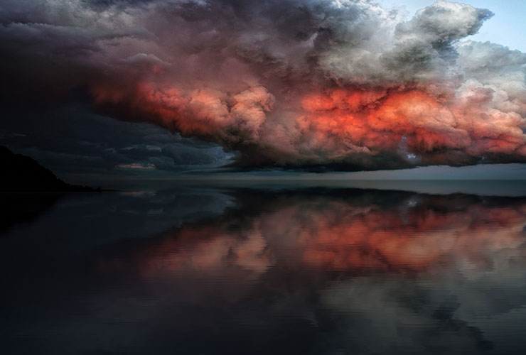 Worry vs. Mindfulness: A Life Lesson by Judy Marano. Photograph of a storm passing over the ocean by Johanes Plenio