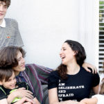 The Secret to Successful Mothering (That Took Me 21 Years to Learn) by Rebekah Borucki. Photograph of Rebekah and her family laughing / playing