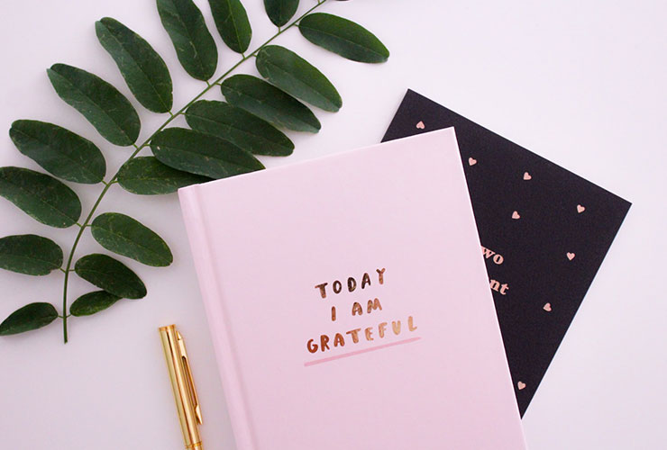 Is Meditation Too Woo-Woo For You? Try These 3 Simple Practices Instead by Tracy Poizner. Photograph of a gratitude journal by Gabrielle Henderson