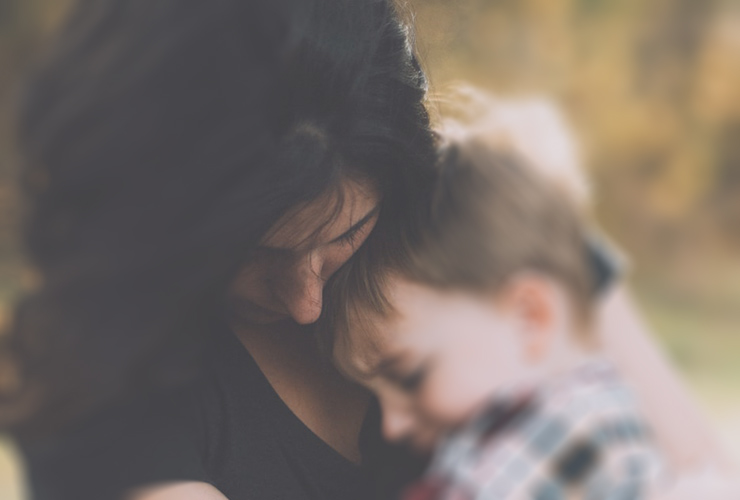 Is Everything Ok? A Call to Be Vulnerable, for Your Child & You by Katarina Wallentin. Photograph of a sad mother and child holding each other by Jordan Whitt