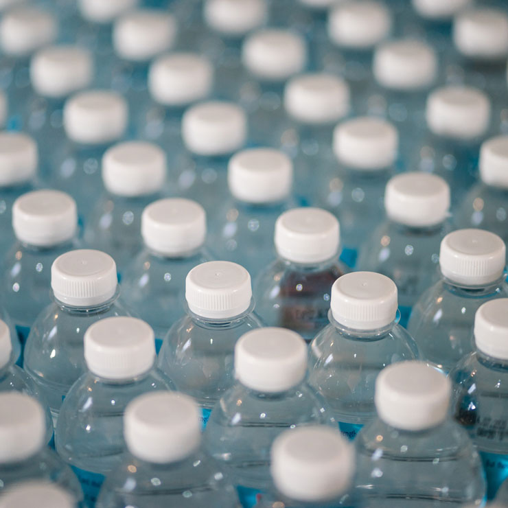 Photograph of plastic water bottles lined up