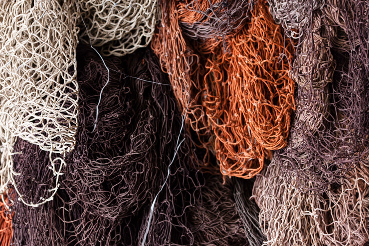 Discarded commercial fishing nets, collected from the ocean to be recycled into technical fabric
