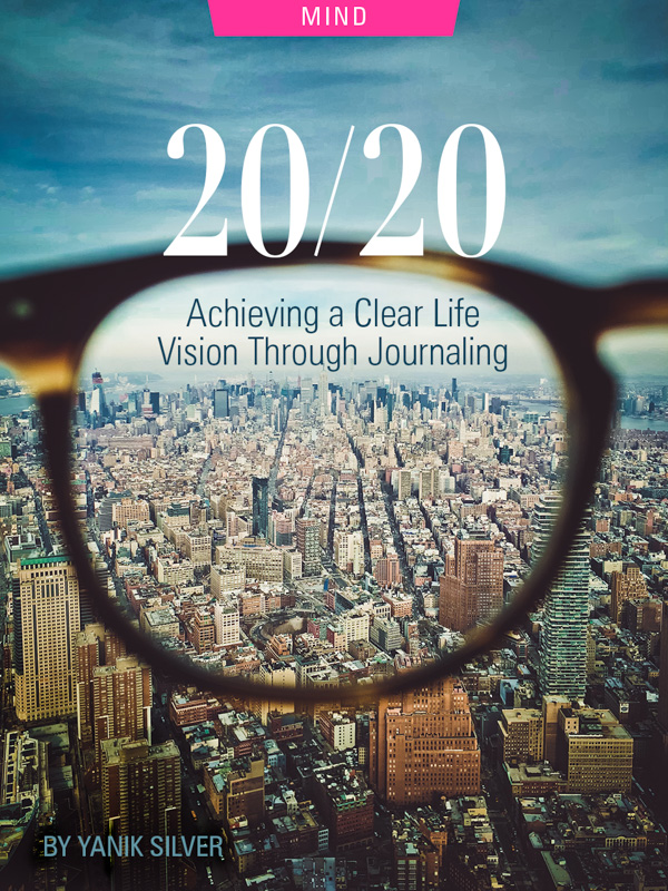 20/20: Achieving A Clear Life Vision Through Journaling, by Yanik Silver. Photograph of city through lens of glasses by Saketh Garuda