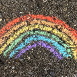 Warrior of the Heart: A Simple Process to Move through Difficult Situations by Heather Ash Amara. Photograph of a rainbow colored in the dirt by Alex Jackman.