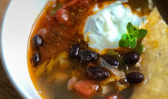 Soup’s On! Musings On Life & A Recipe For Summer Black Bean Soup With Cucumber Yogurt by Christine Moss. Photograph of the black bean soup, courtesy of Christine Moss.