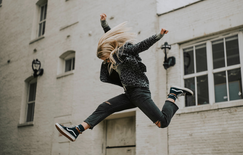 7 Ways To Boost Your Self-Confidence, by Paisley Hansen. Photograph of girl jumping by Adrianna van Groningen