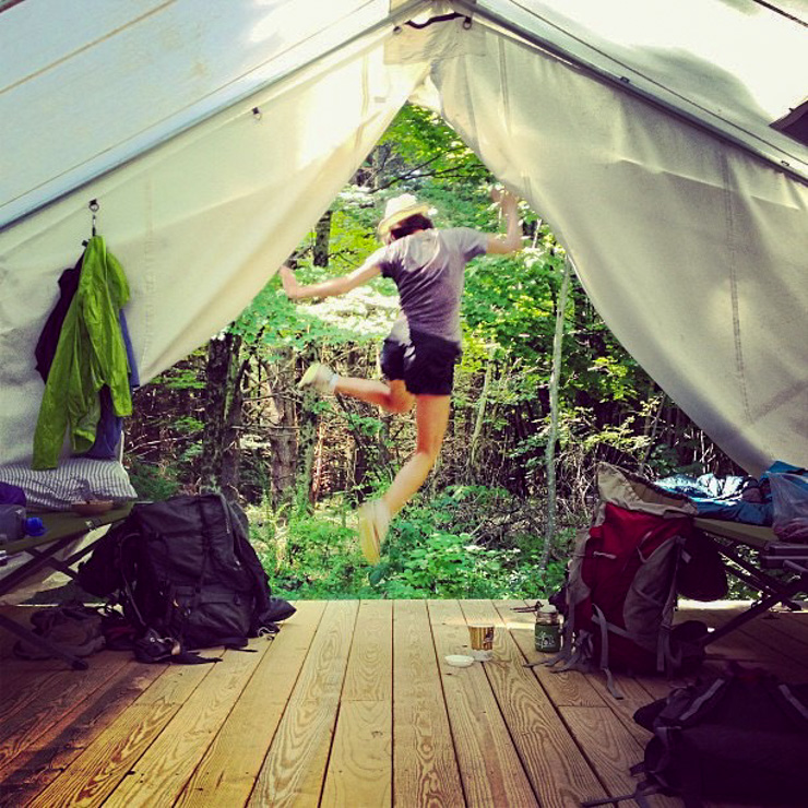 Photograph of Gina jumping with joy, courtesy of Gina Rae La Cerva.