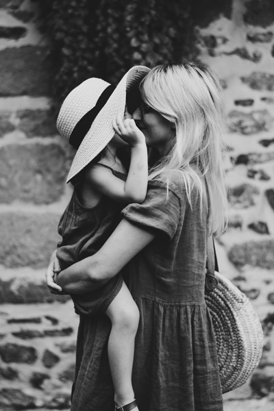 What I've Learned About Being a Mom in 2020 by Holly Schaeffer. Photograph of mother and daughter by Caroline Hernandez