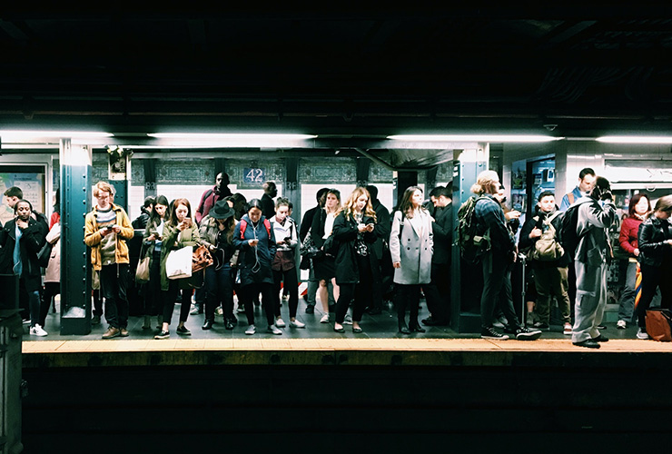Beyond Small Talk: Becoming Willing to Explore Deeper Conversation and Connection by Judy Marano. Photograph of people waiting on a subway platform by Eddi Aguirre