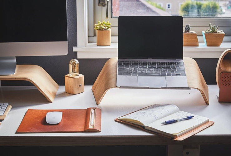 Turning Your Home Into a More Healthy and Productive Space in 2021 by Jori Hamilton. Photograph of a neat desk space by Ken Tomita, courtesy of Pexels