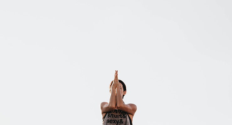 The Art of Peaceful Living, by Roberta Hughes. Photograph of woman in yoga pose by Stephanie Greene