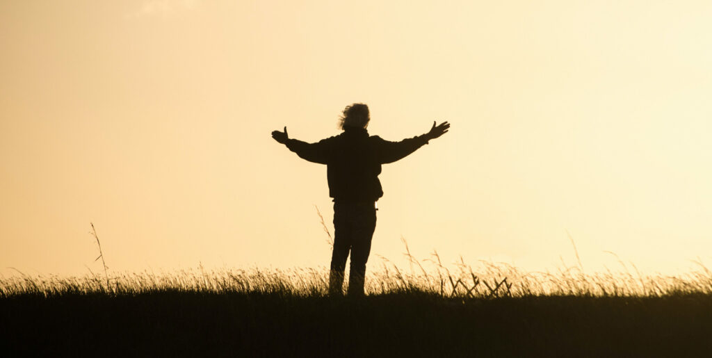 The Power of Gratitude: How Practicing Gratitude Enriches Your Life and Tips for Getting Started, by Barbara Bloom. Photograph of man with outstretched arms by Debby Hudson