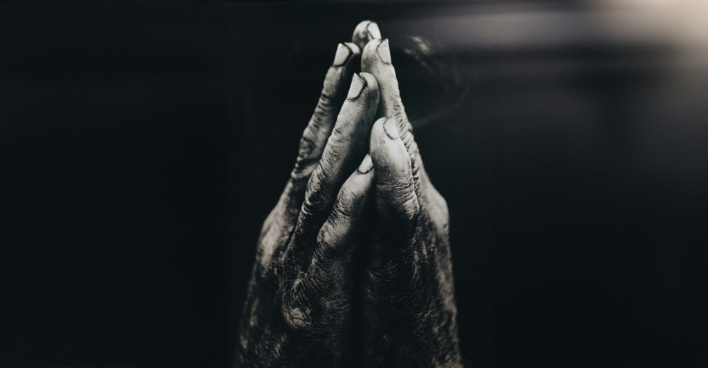 Rituals of Love: Exploring 3 Religious Practices which Foster Faith, Love & Unity, by Kelly James Clark. Photograph of hands praying by Nathan Dumlao