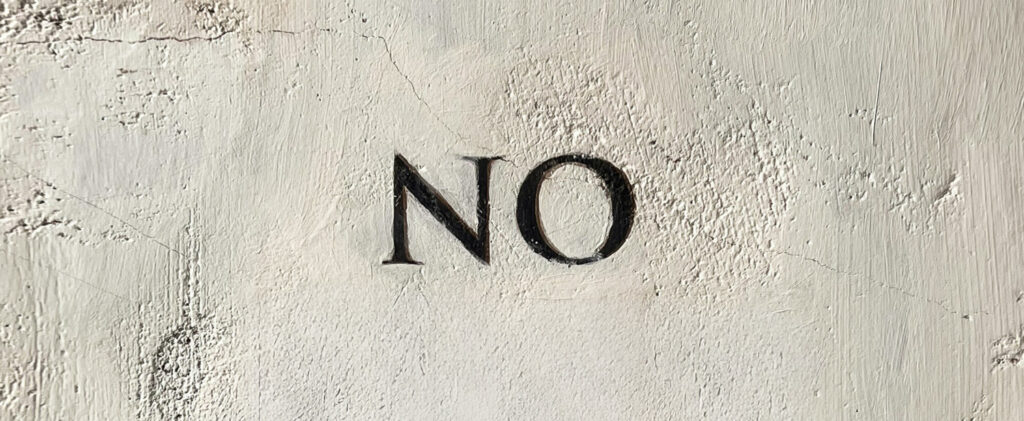 How and When to Say No, by Barbara Bloom. Photograph of wall with word NO, by MK. S